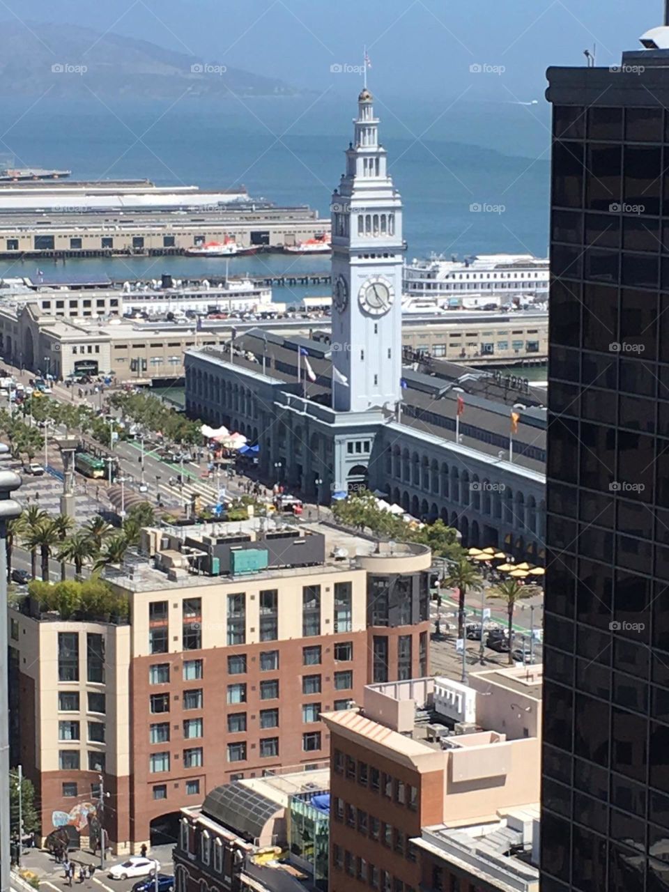 i am sometimes able to travel with my husband when he has to travel far for his work. Today he had to travel to San Francisco to work on a building on the Embarcadero. This picture is one of the views from the roof of the building.