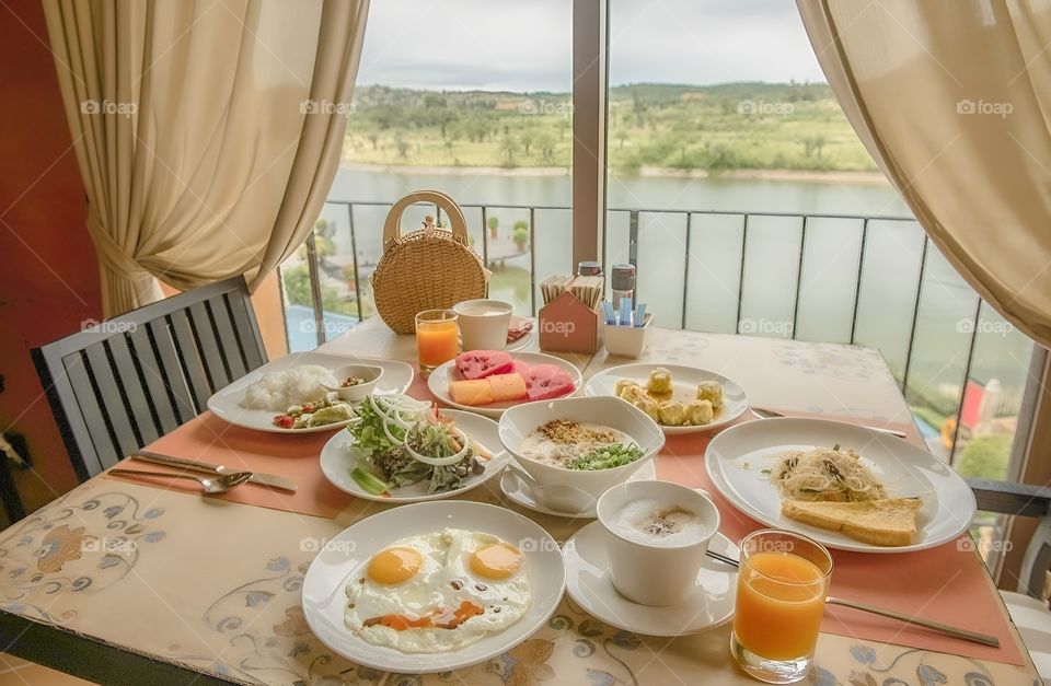 full set of breakfast with the river side view