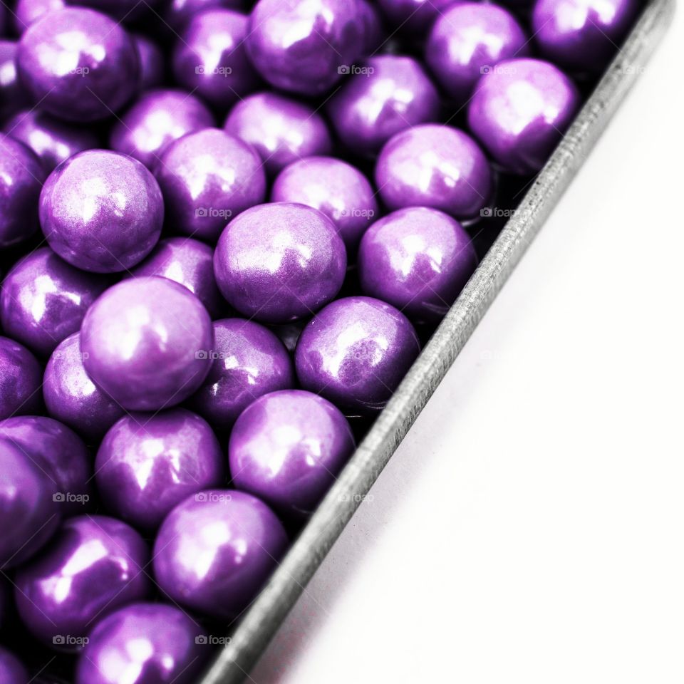 tray of purple pearlecent candy