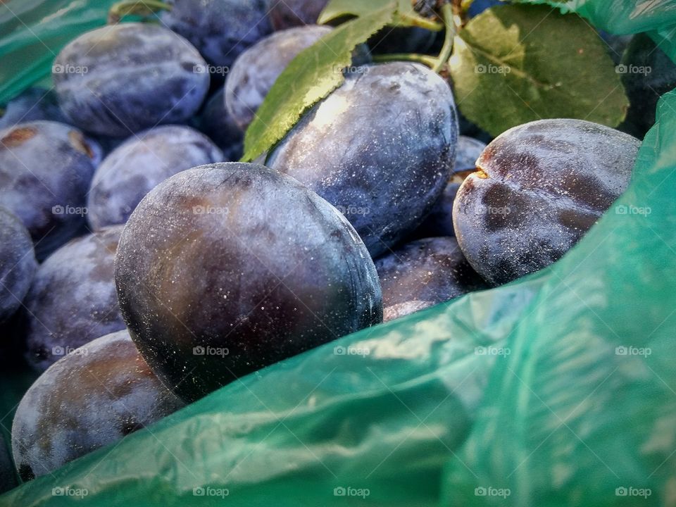 plums in a bag, fruits, autumn harvests, vitamins, healthy food, plum fruits