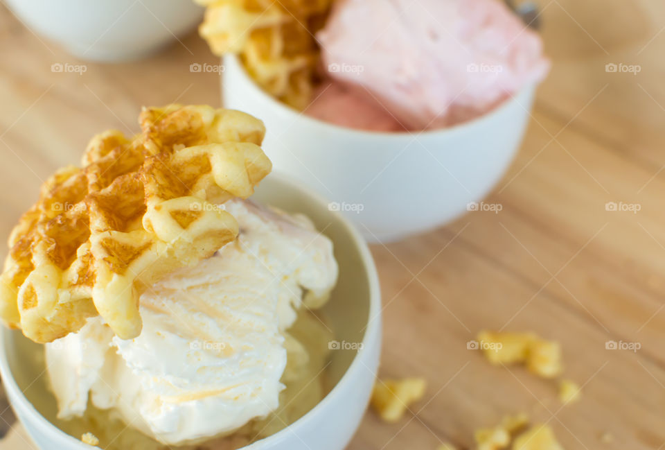 Vanilla ice cream scoops with bite sized waffle