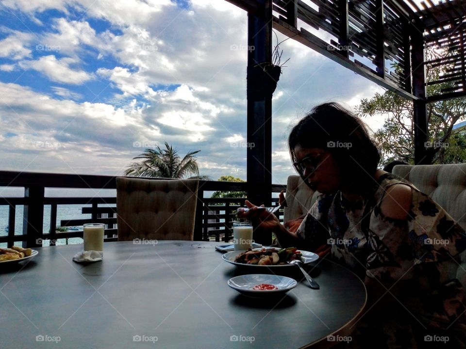 Sunny day, Sky, Cloudy and she enjoys them a lot during breakfast