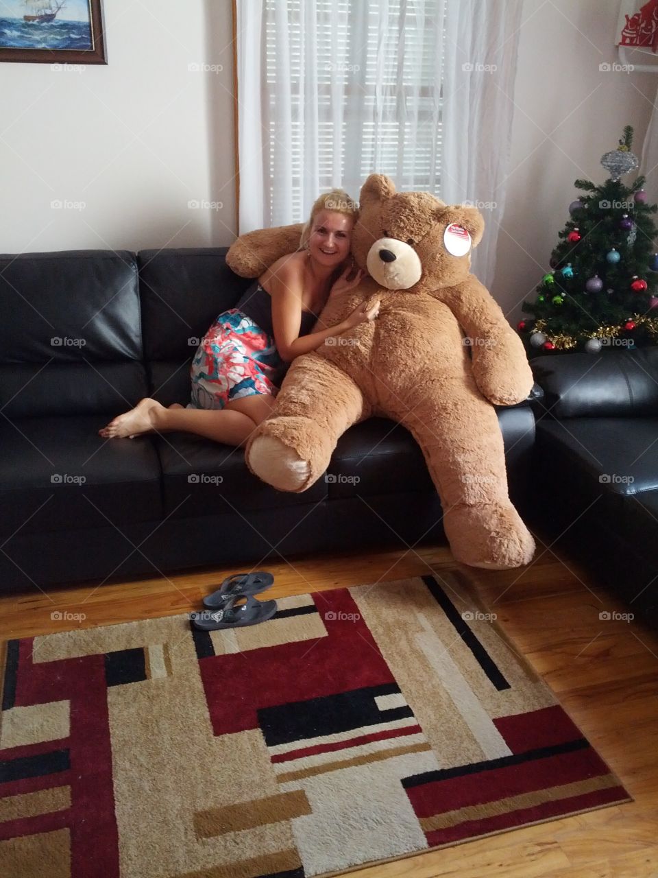 Huge teddy bear on the couch with me