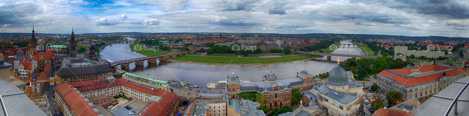 between us and the horizon. view above riverside of dresden