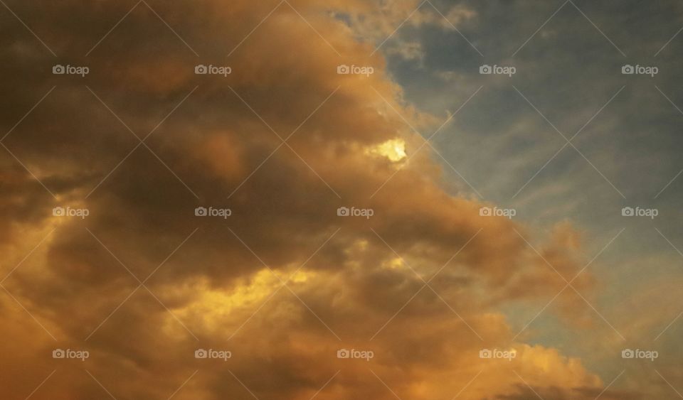 Storm Clouds cover Sun