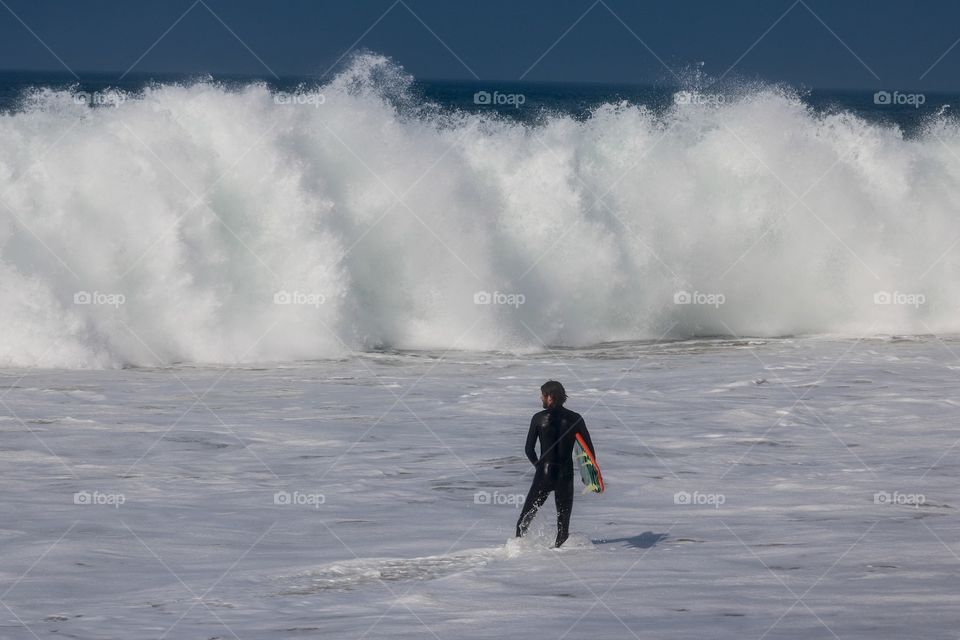 Surfer braving the BIG waves at The Wedge, Newport Beach, CA
