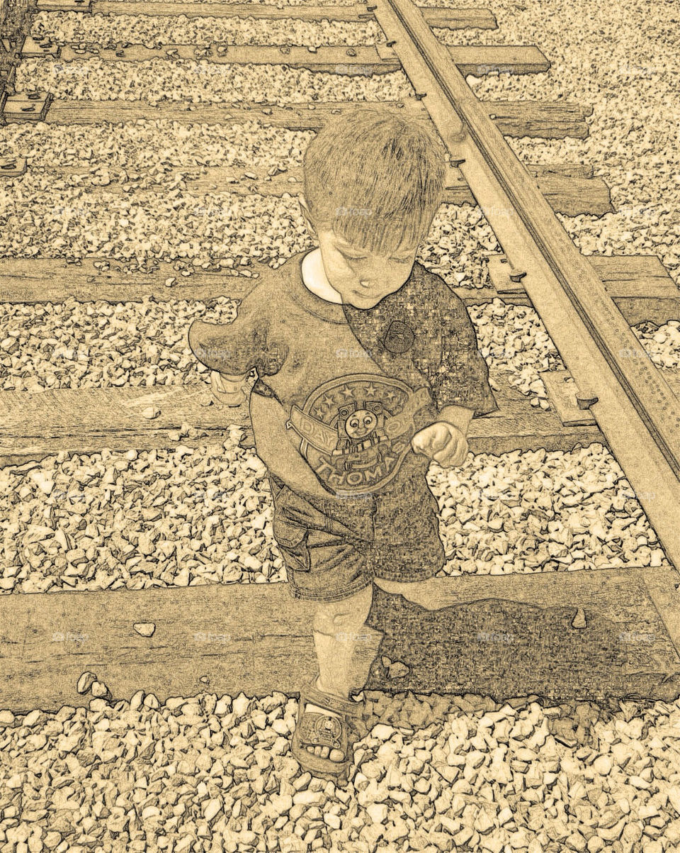 Train Tracks and a boy