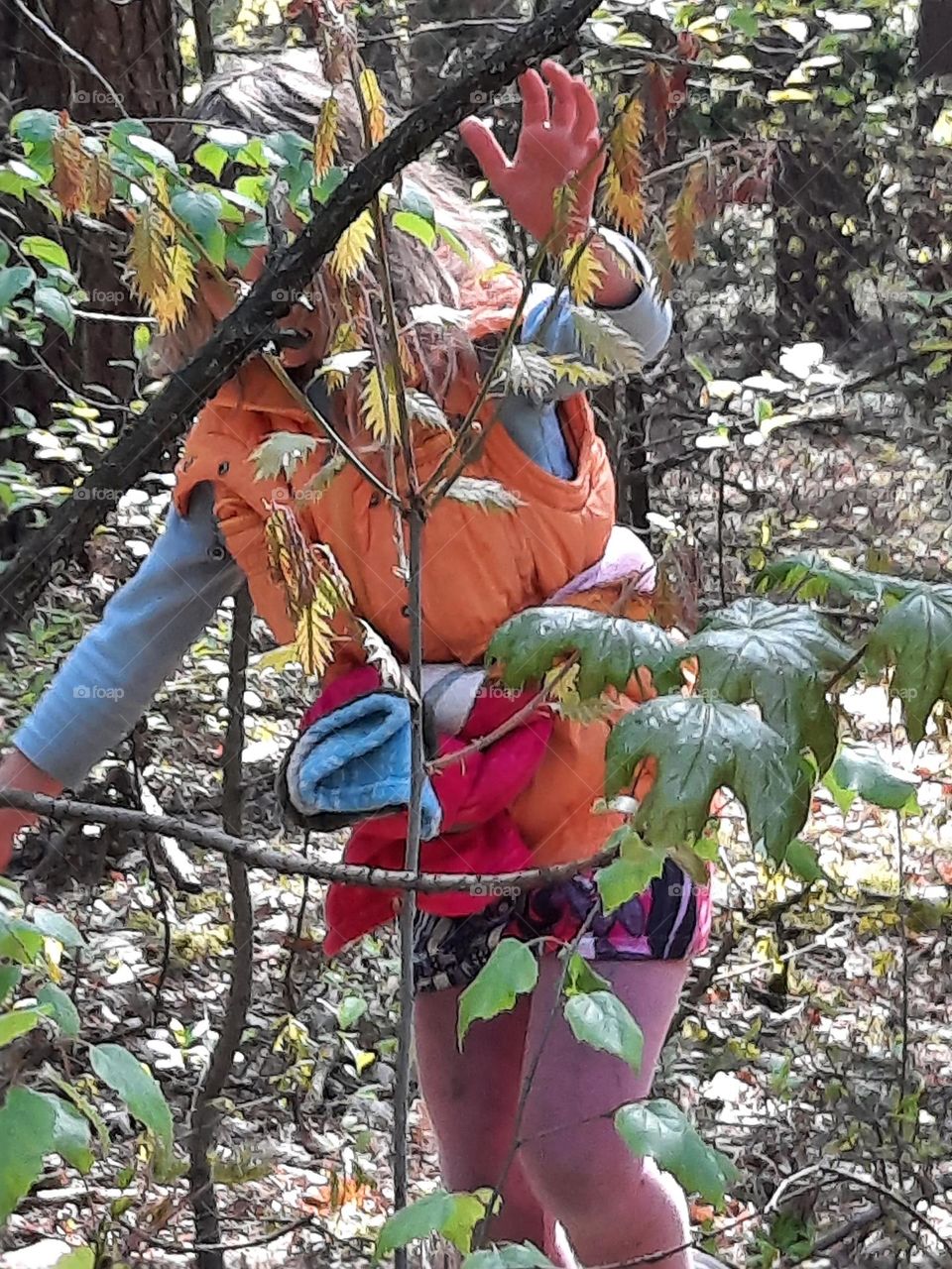 litlle girl in spring forest