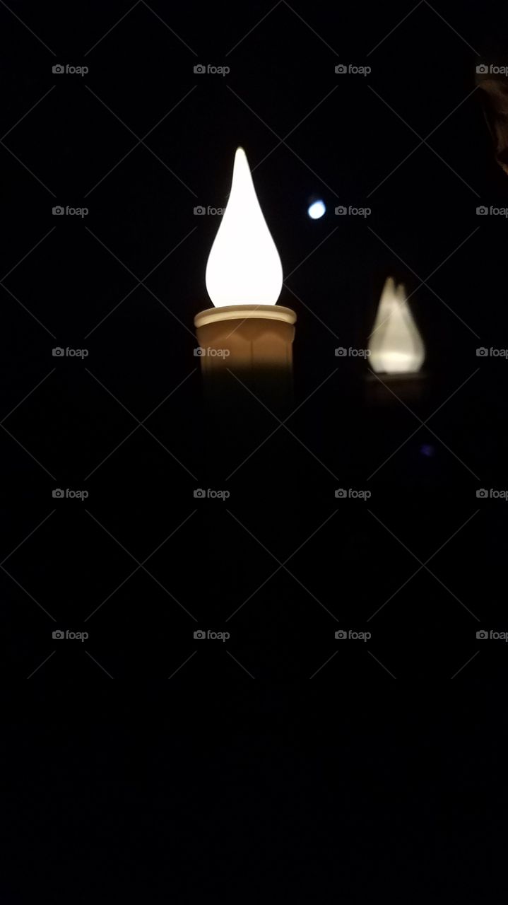 Candle reflection in the moonlight