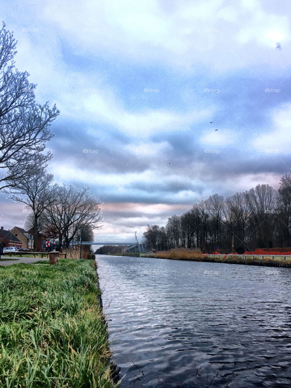 Colorful dark clouds over the river 