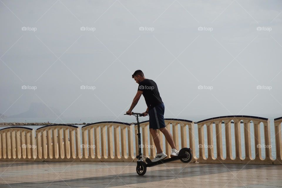 Scooter#human#sky