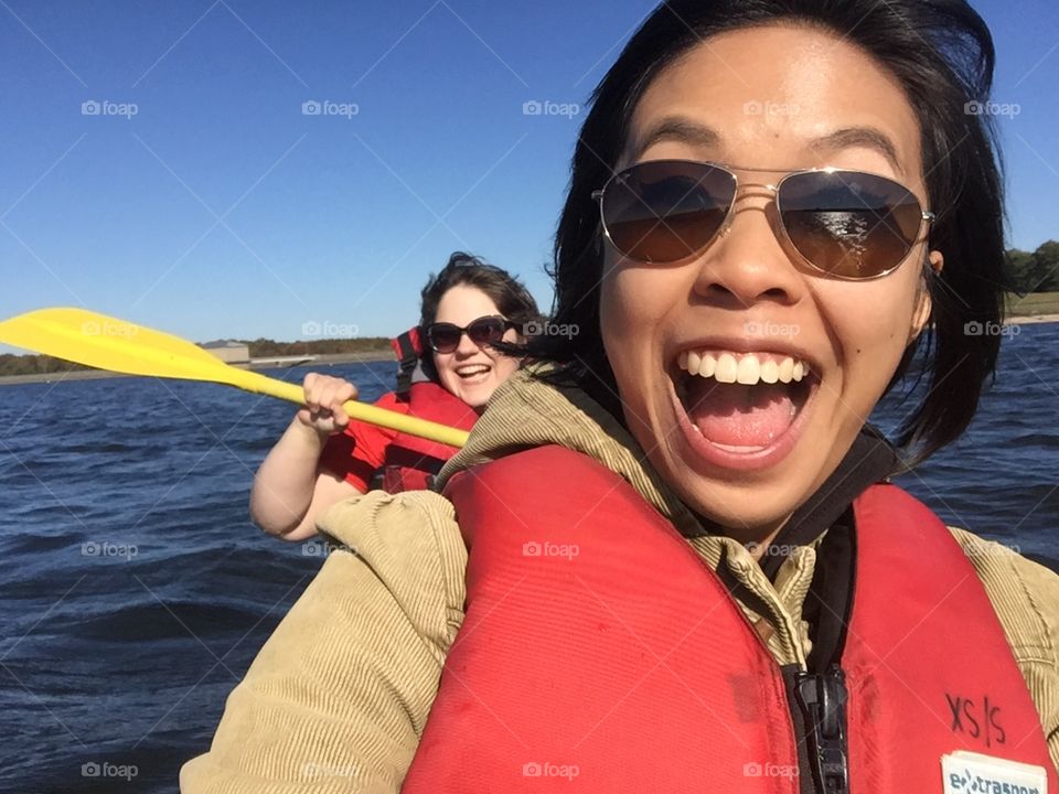 Kayaking . My friend has never been out on the water before and doesn't know how to swim. But I got her to kayak, and she loved it!