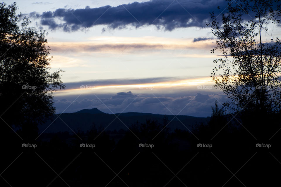 Sunset with a mountain silhouette 