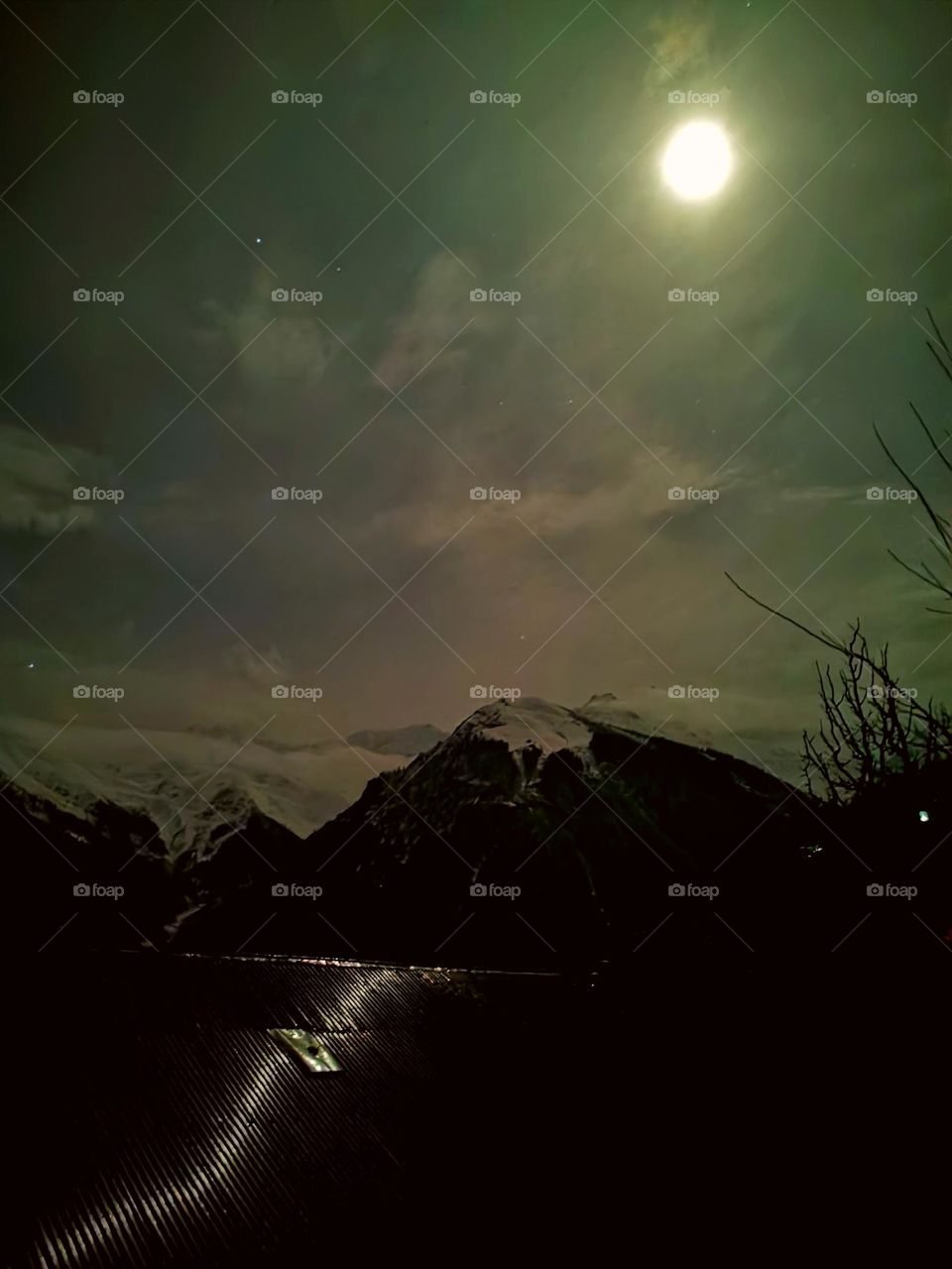 Reflect on ; moonlighting on cloudy night