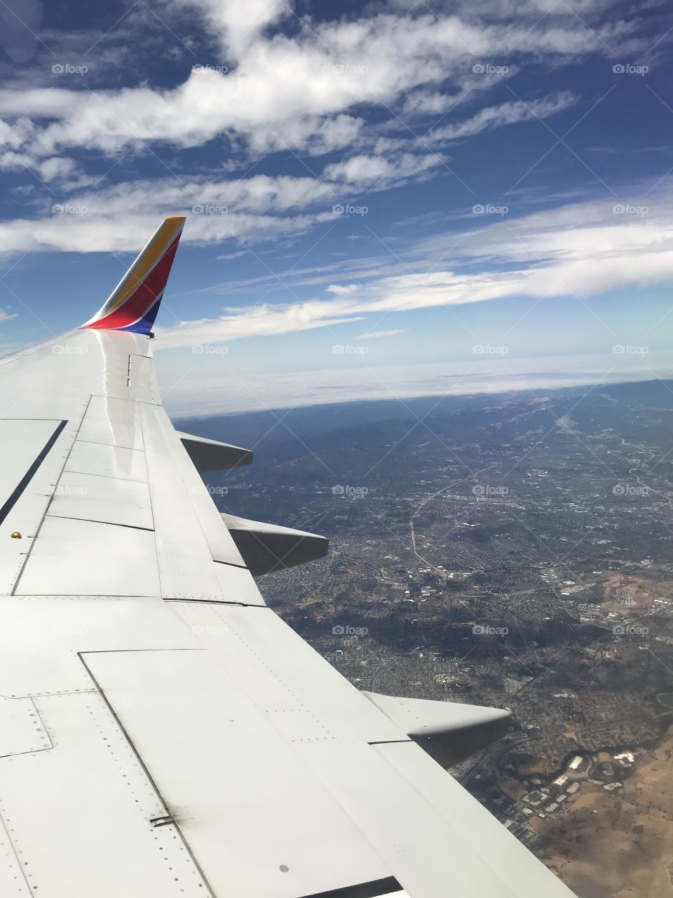 Southwest Airlines Boeing 737 flying over San Jose California right after taking off from Norman Y. Mineta San Jose International Airport (SJC)