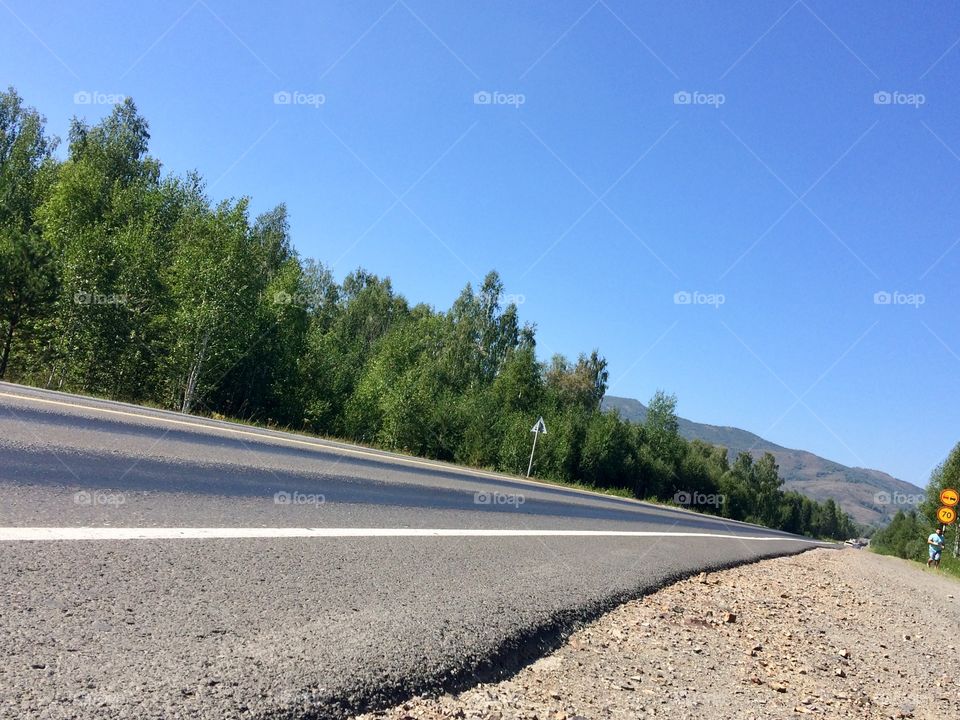 Asphalt track forest white stripe russia 