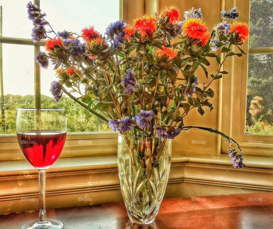 Floral Arrangement With Red Wine