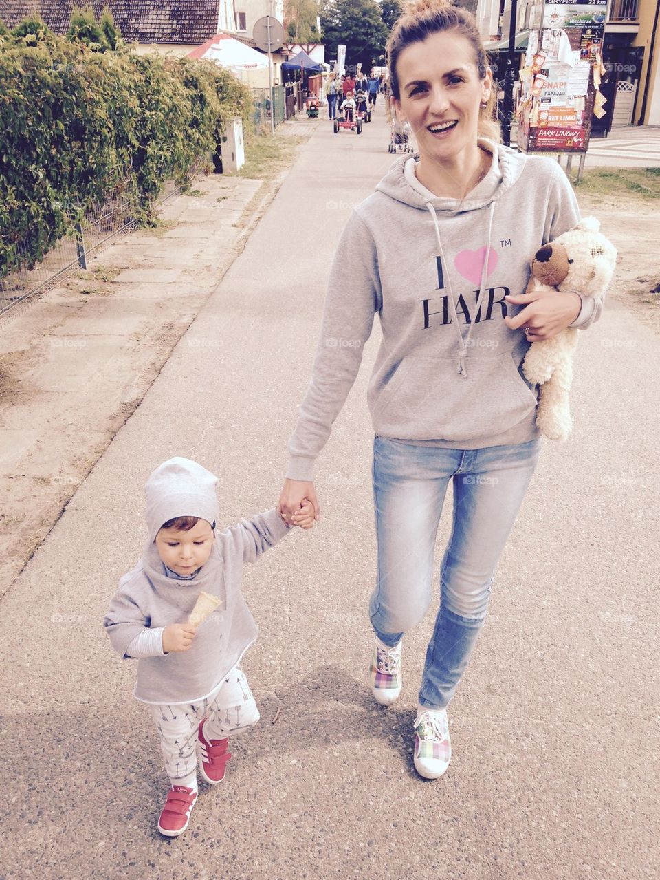 Walking mother with baby