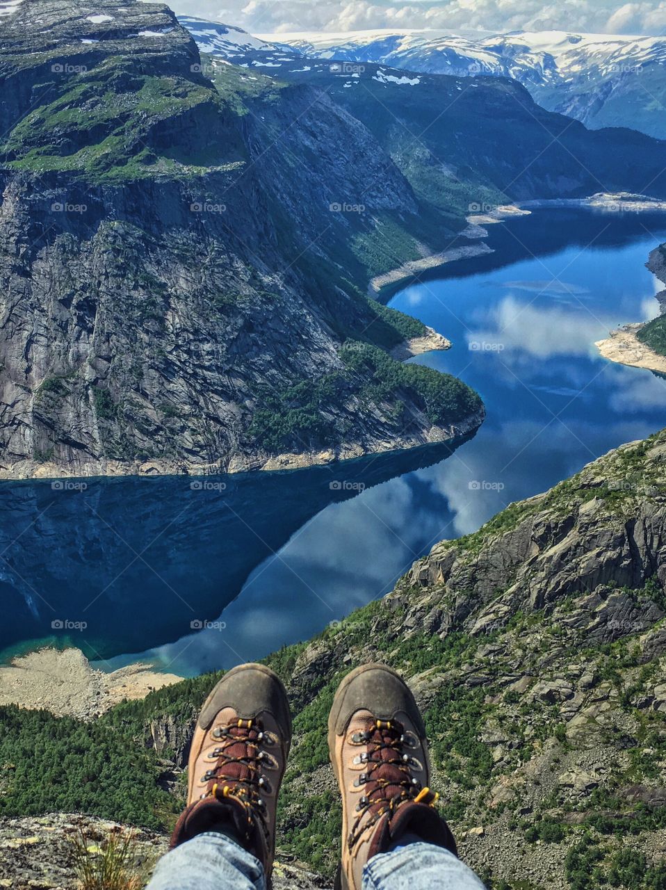 Hiking boots above lake Ringedalsvatnet, Trolltunga