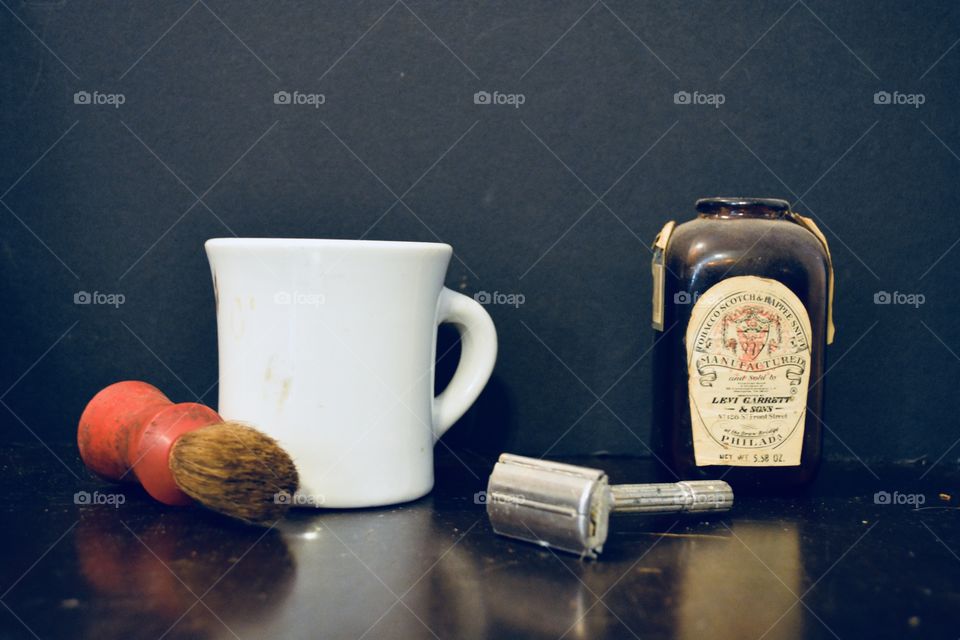 Antique shaving , razor, cup and soap brush. Also old snuff glass bottle