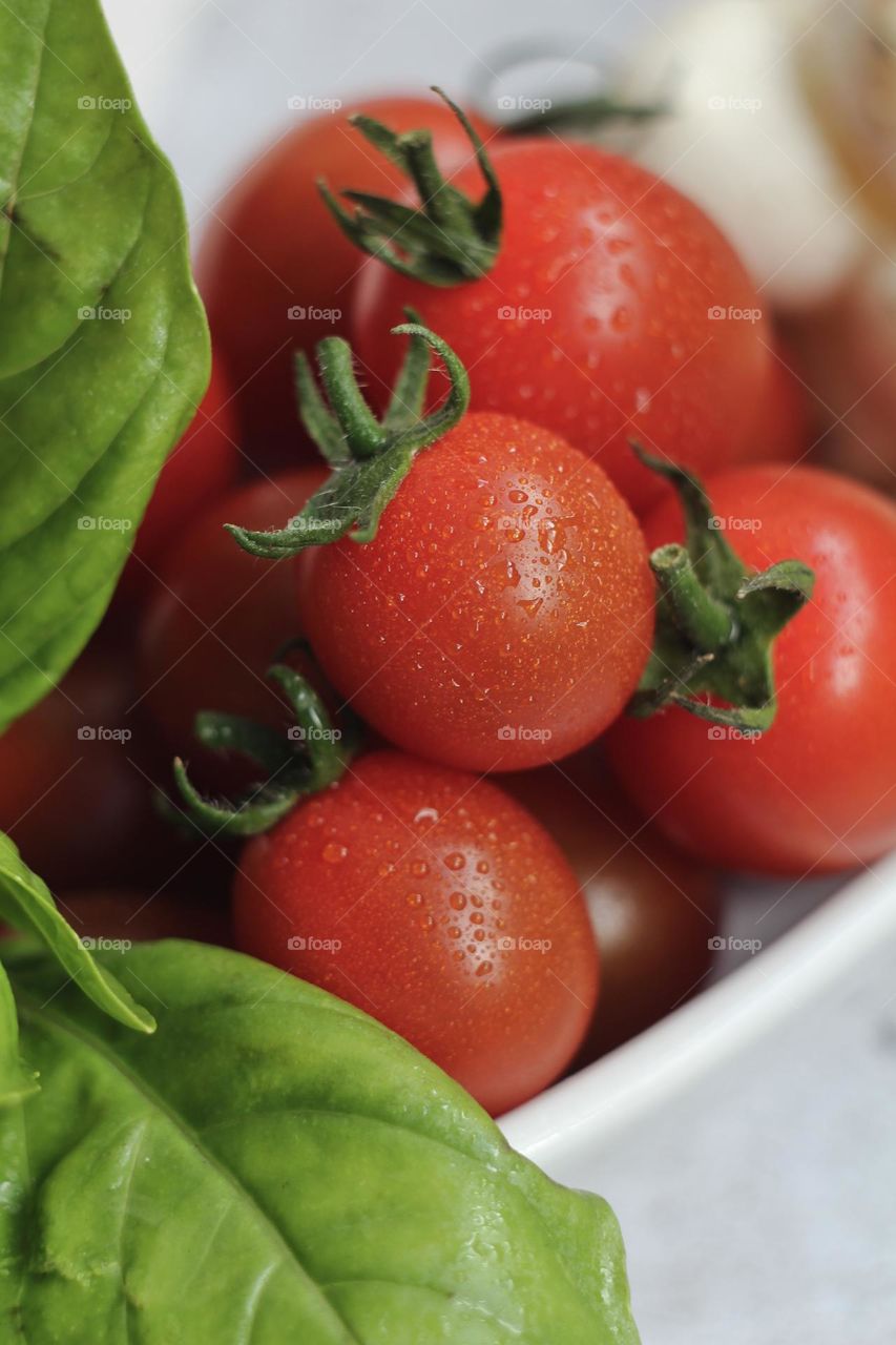 Tomatoes with drops of water