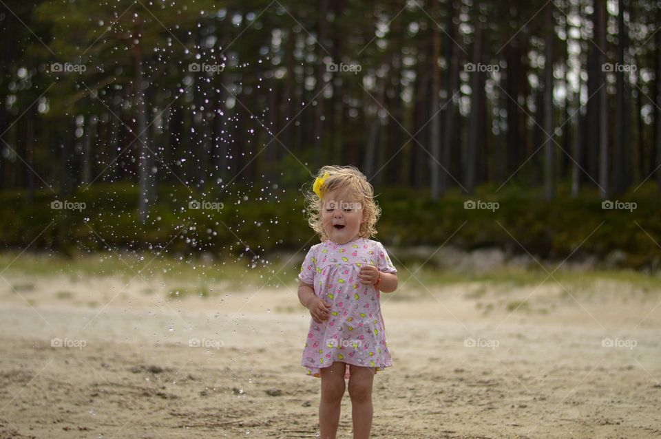 little girl on the beach.