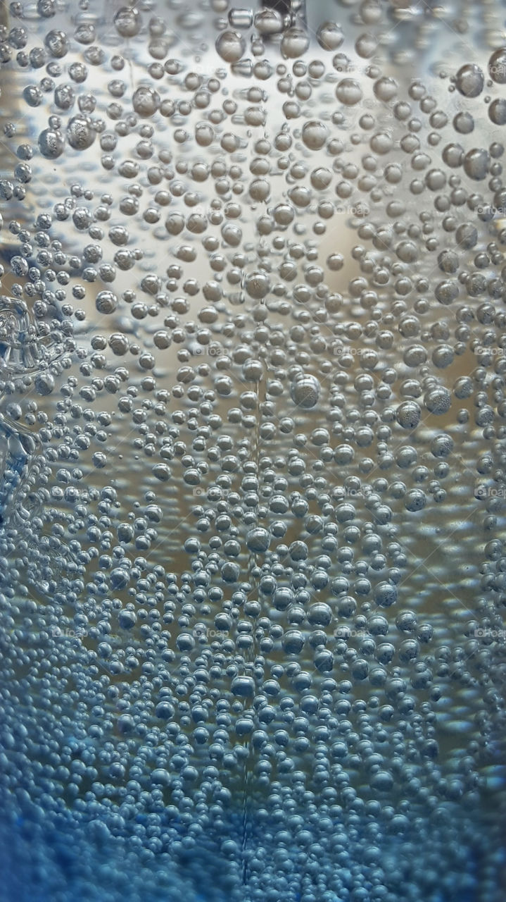 Bubbles in water glass 