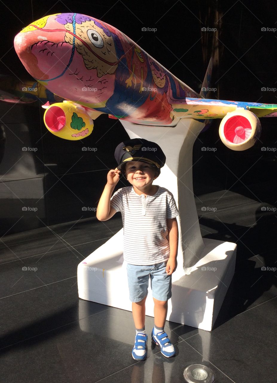 Smiling boy with pilot cap