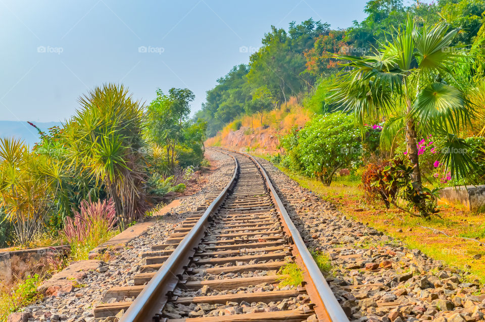 Photograph Mountain Railways Track Vizag India snap in landscape style. Subject is adventure inspiration exciting calm beautiful. Useful for background screen saver. Travel Transportation Concept