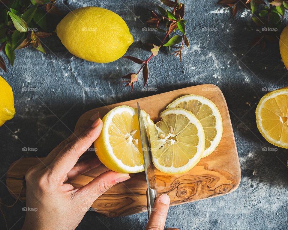 Cutting lemon.