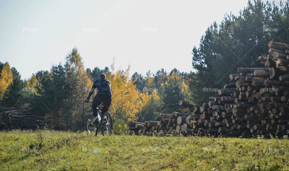 person riding bike beautiful nature landscape