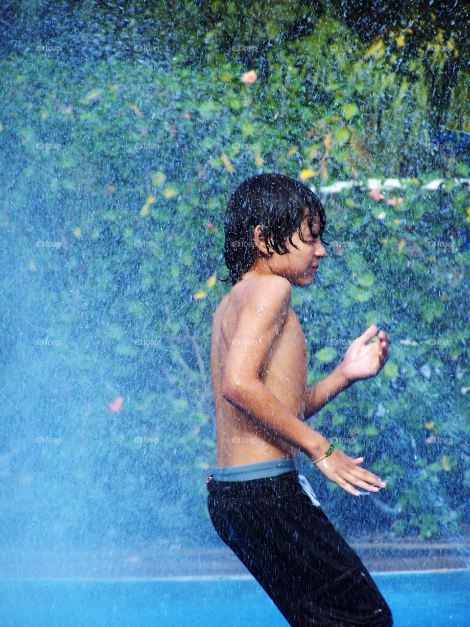 summer water playing boy by vladimiryleon