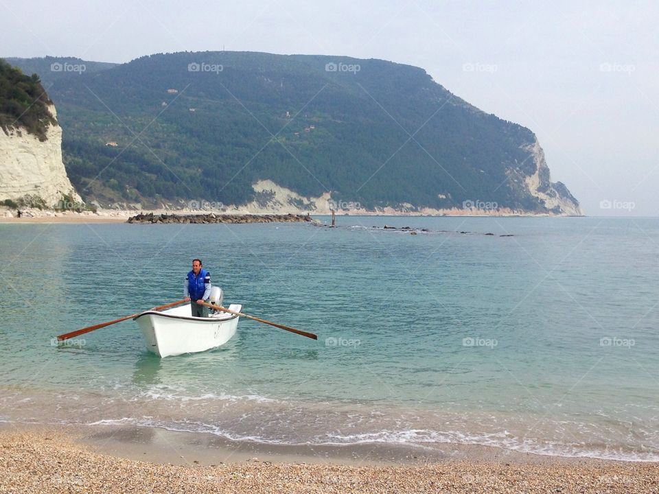 Sailor at work. Sailor at work on the Italian sea