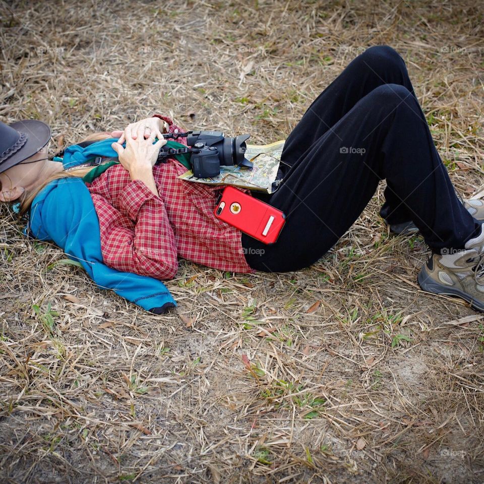 Woman taking a little nap after a long hike.