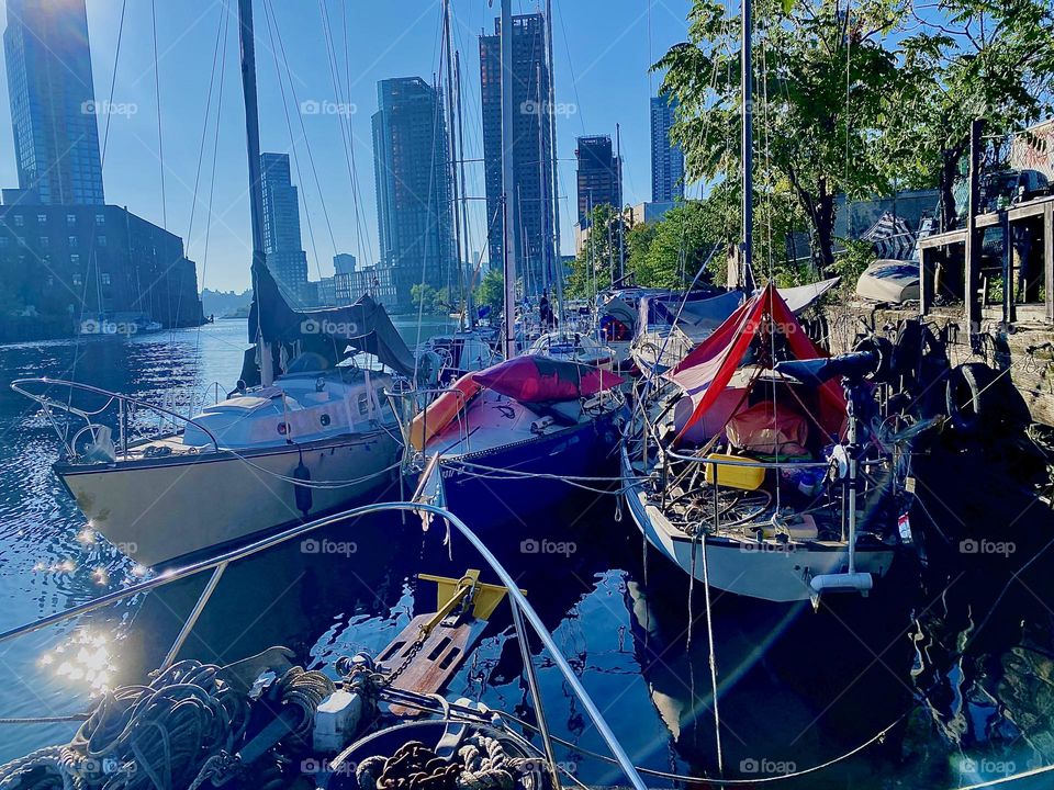 This is beautiful “Newtown Creek” by the “Pulaski Bridge” in LIC, Queens seen from aboard the “Salvation”, the “28 ft 1969 Luhrs” cabin cruiser we call home on one of the last really warm days of the season in early October 2023. Hypnotic Productions