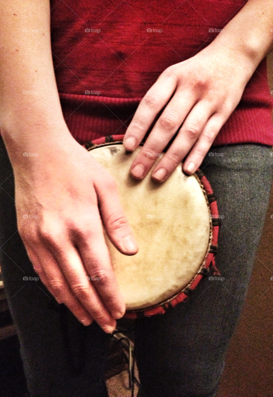 hands playing music instrument by analia