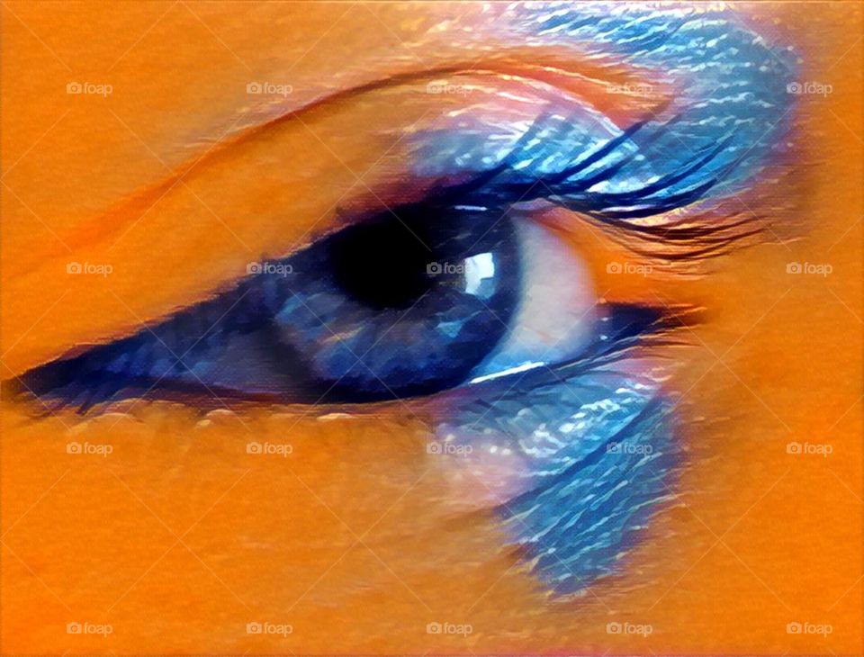 Abstract of a child’s eye closeup, primary color blue