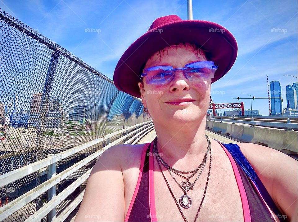 On an extremely hot day in July 2022 I walked over the “Pulaski Bridge” to shop for extra juices and some ice to keep them fresh & cold in our cooler. It was my “Best Selfie” mission pic. I wanted it on the “Foap” market, too. Hypnotic Productions