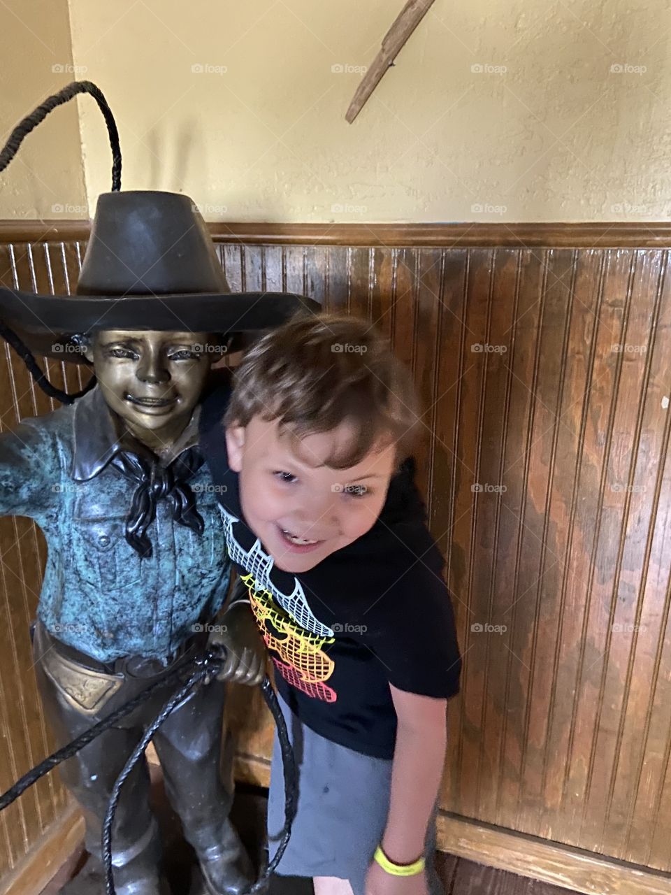 Howdy partner, special needs will not hold him back. He was so happy he had to have a hat. Cowboy at heart. Capture a little cowboy fan