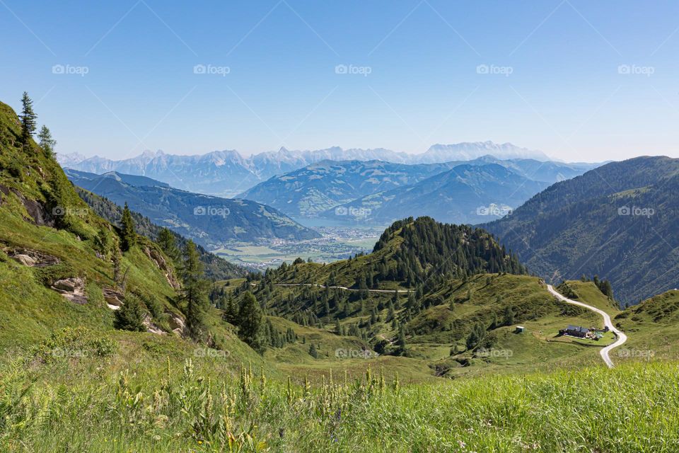 Panoramic view of beautiful mountains and lake zell am see Austria on a beautiful sunny day with blue sky 