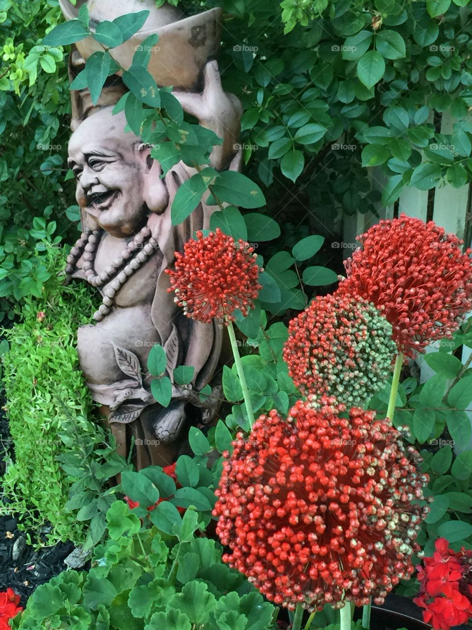 Buddha smiling in the garden 