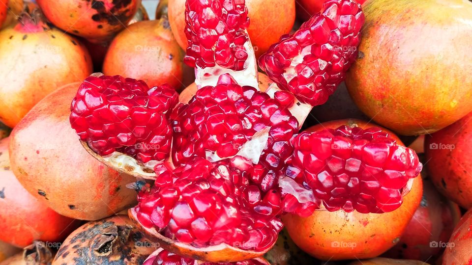 Inside of Pomegranate looking like corals and very delicious if you taste it.