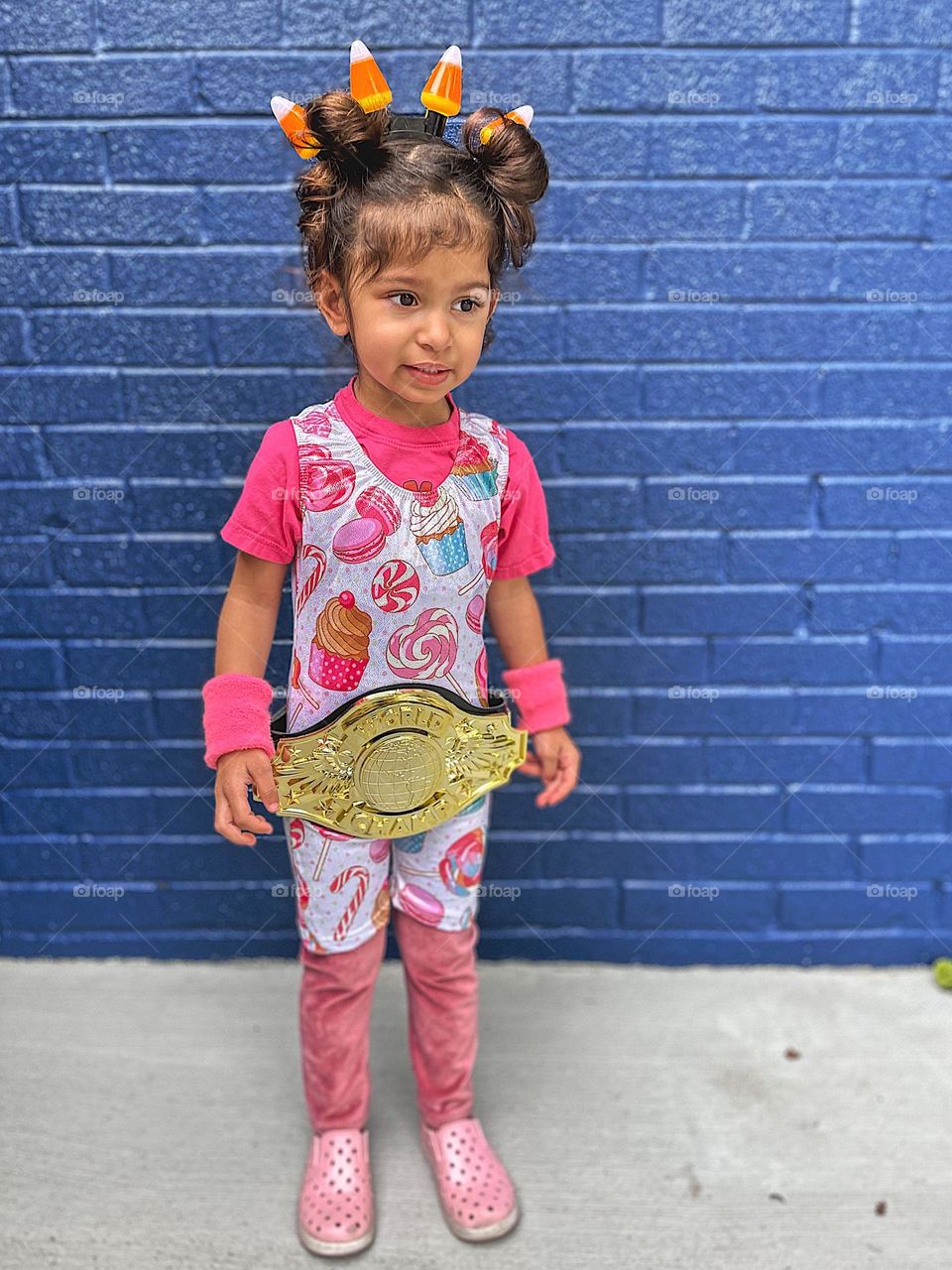 Toddler girl dresses as a wrestler, wrestler costume for Halloween, wearing a costume, ready for Trick or Treating, toddler goes trick or treating on Halloween, wearing costumes on Halloween 