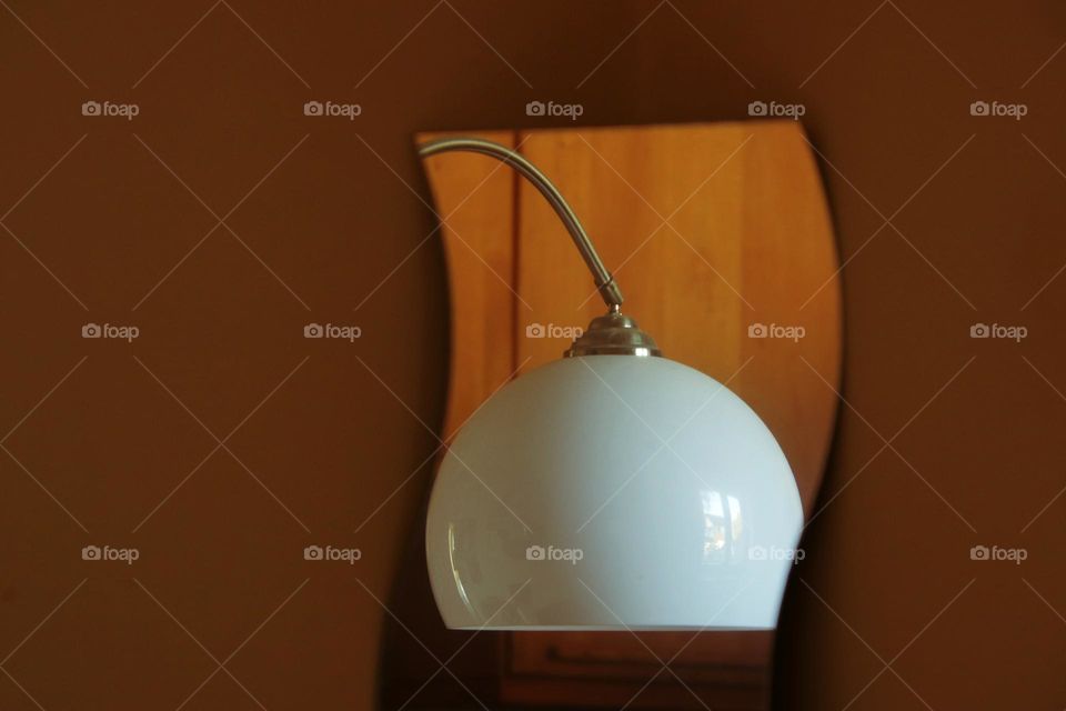 Reflection of an arc lamp in a mirror