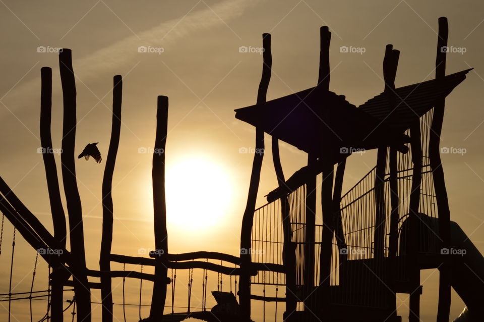 sunrise over the Playpark and a crow