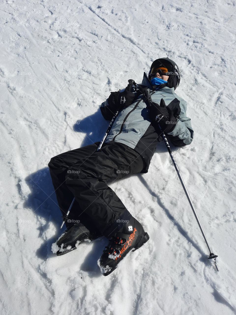 boy on ski suit on the snow