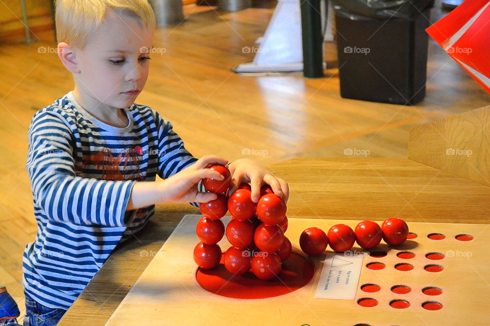 Boy playing with a toy