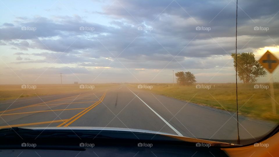 View of dust storm from a vehicle