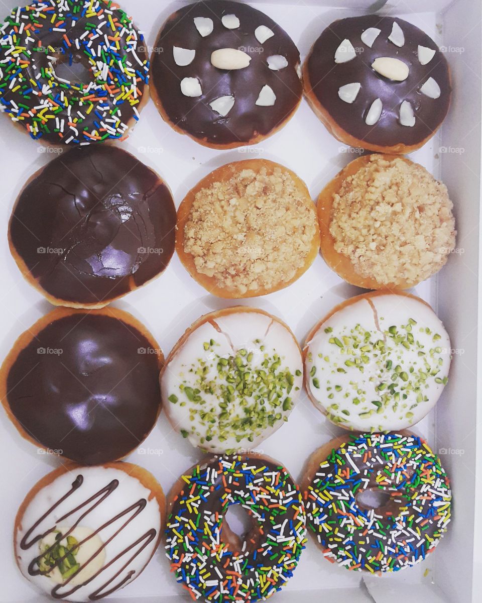 A box of donuts for sweet tooth.
