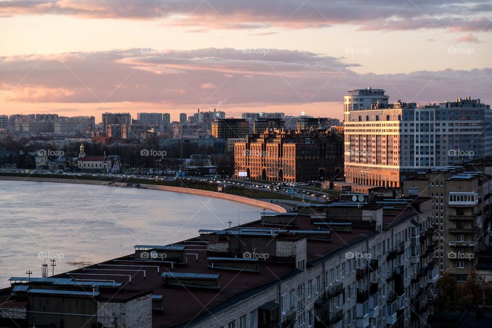 View of the city and the bend of the river at sunset